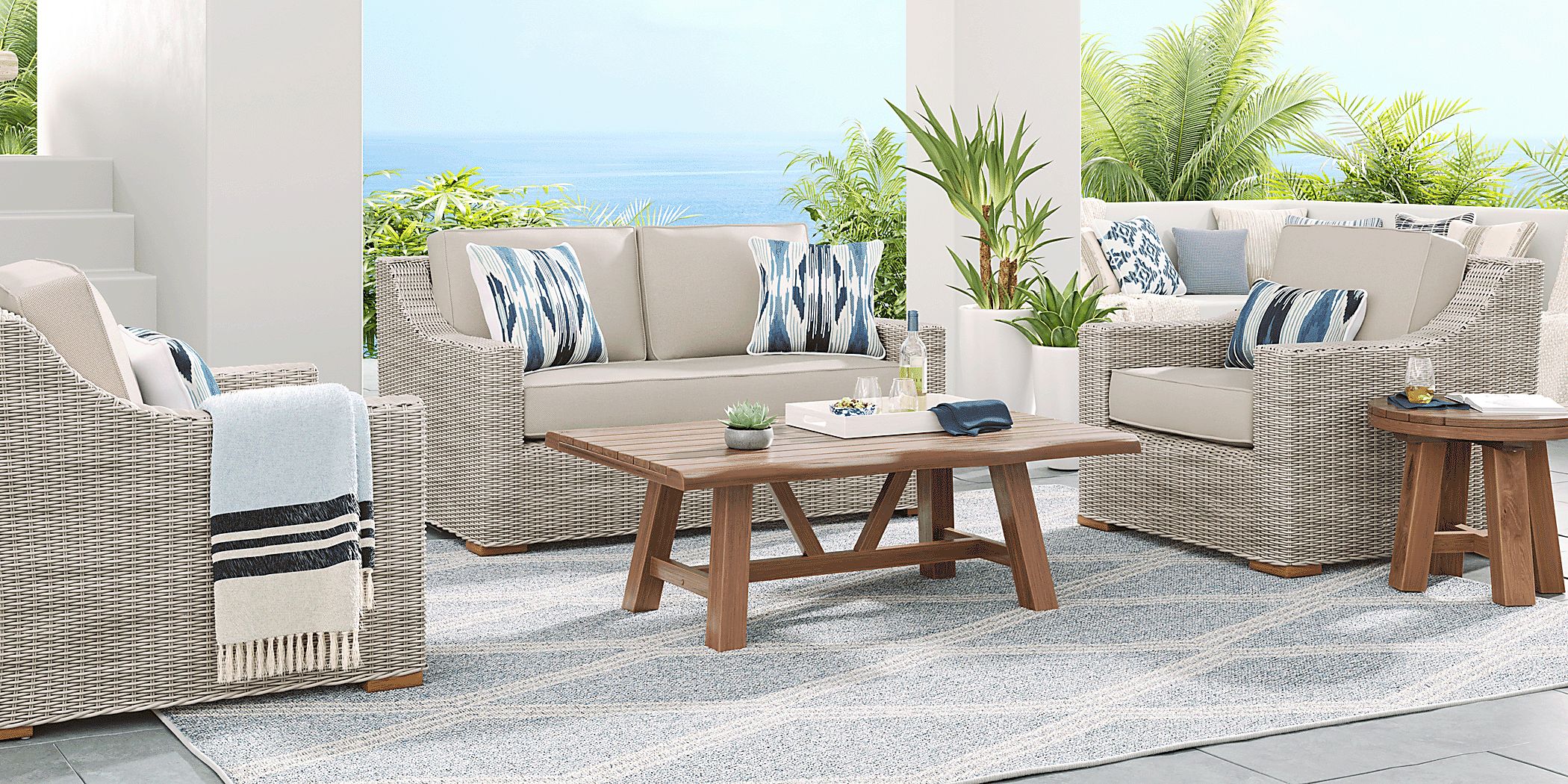 Rooms To Go Outdoor Patmos Gray 4 Pc Outdoor Loveseat Seating Set with Linen Cushions